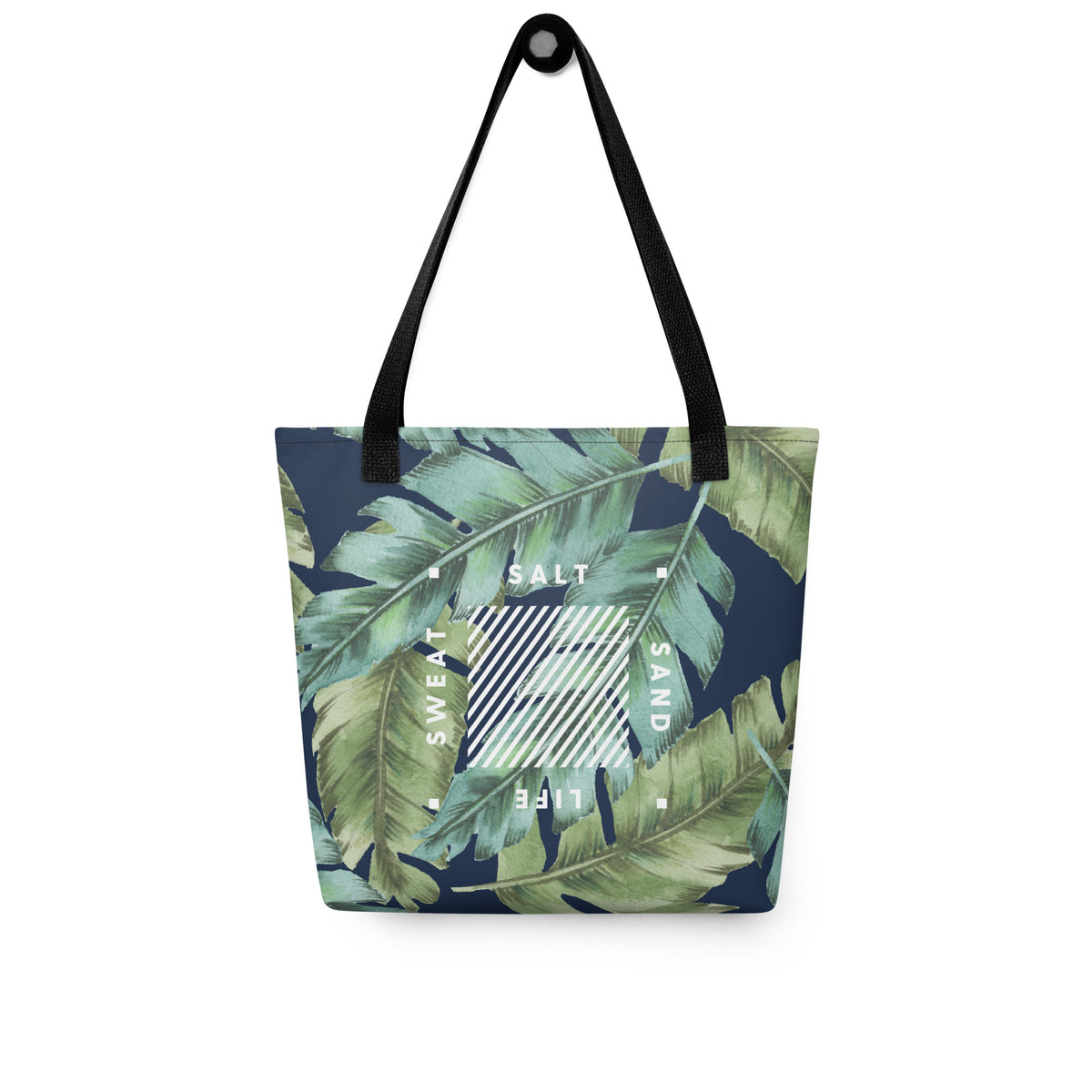 Sand Salt Sweat Life tote bag hanging from black strap