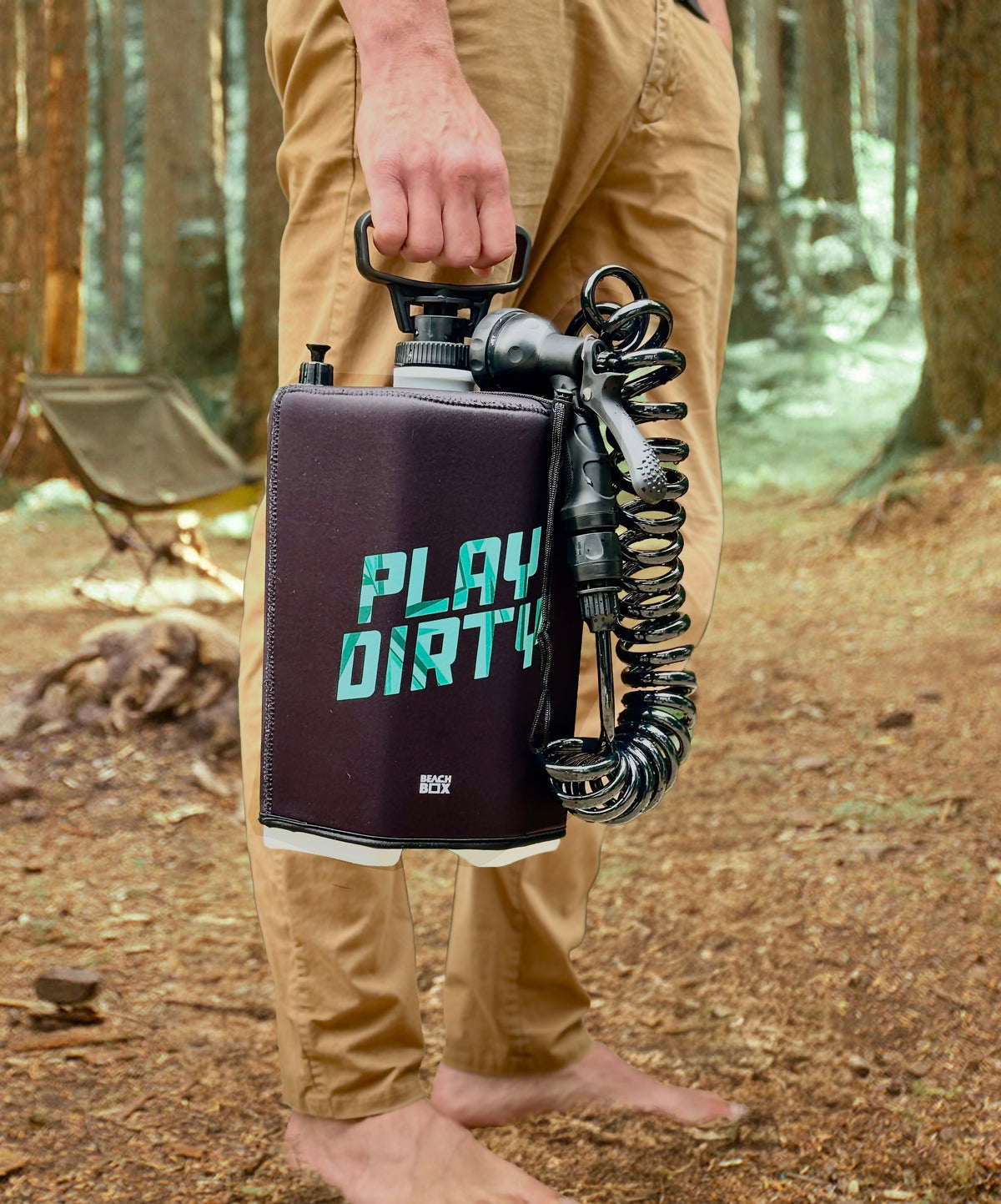BeachBox portable shower tank at a campsite for van life and overlanding