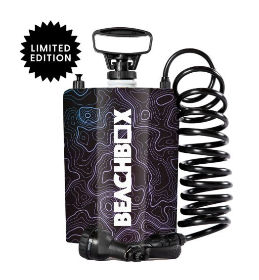 Limited edition BeachBox portable shower tank in a purple topographic pattern with coiled hose